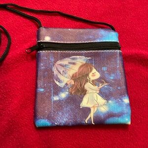 small girl in the rain purse